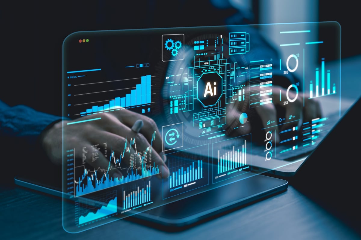 Professional working with data charts and analytics on multiple monitors